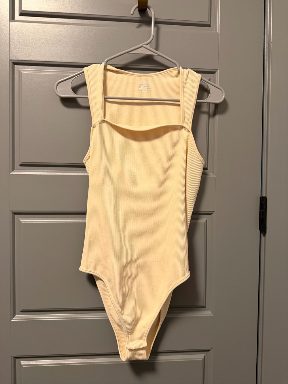OQQ Neutral Ribbed One-Piece Bodysuit Cream XL